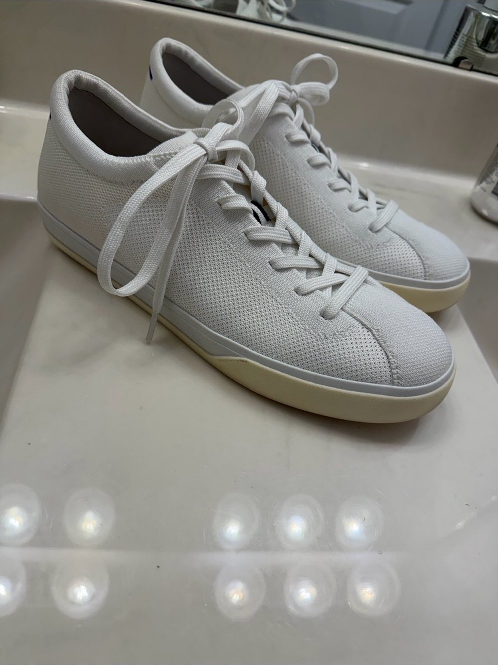 Rothy’s the lace up sneaker bright white size 10.5